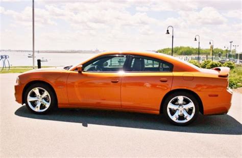 The first charger was a show car in 1964. 2011 Dodge Charger R/T Max - Toxic Orange