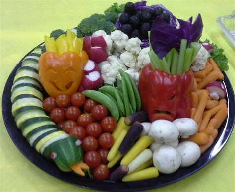 Halloween Fun With Veggies Vegetable Tray With Cucumber Snake Bell