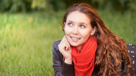 Young Girl With Red Scarf Lying On Green Grass Stock Photo Image Of
