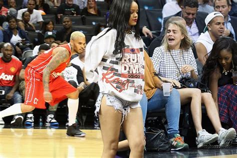 Rihanna Looks Unimpressed And Awkward As She Watches Ex Chris Brown