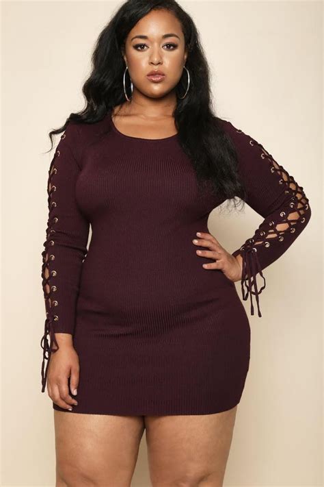 a classic plus size mini dress with a bit of edge features rib knit material and fabric with a