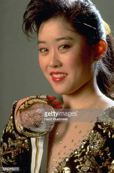 Closeup Portrait Of Usa Kristi Yamaguchi Victorious With Gold Medal