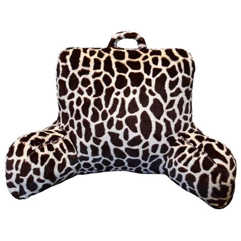 A Giraffe Print Pillow Sitting On Top Of A White Background