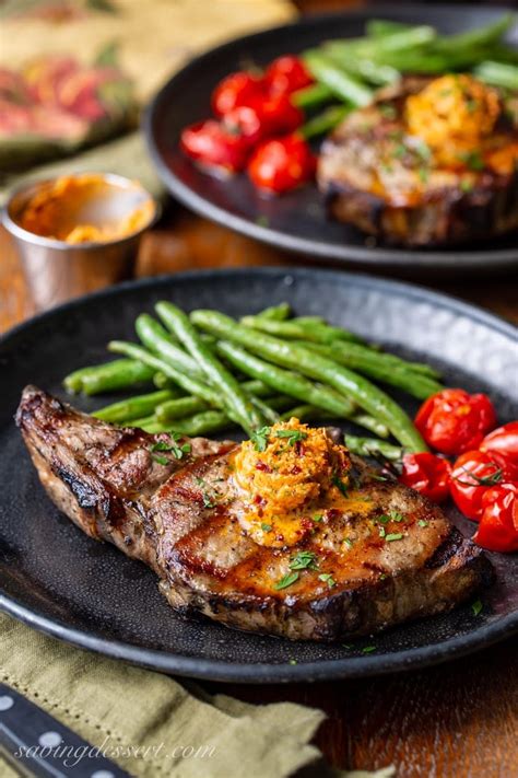 If they are too thin or boneless, they'll be overcooked, dry, and tough. Grilled Pork Chops with Chipotle Butter | Recipe in 2020 ...