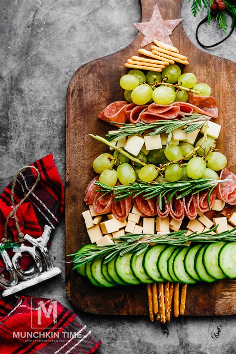 Arrange the thyme springs through out the grapes on the platter like in the photo of the recipe. Christmas Tree Cheese Platter Recipe - Munchkin Time