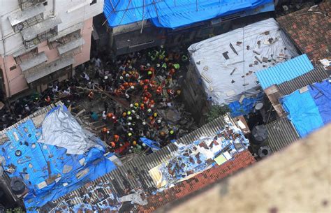 Rescuers Look For Survivors After Building Collapse In India