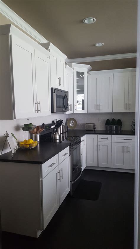 White Kitchen Cabinets With Black Granite A Classic Combination For
