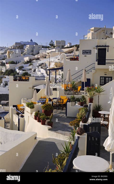 Hotel Balconies In Thira With Caldera Scenery In Santorini Stock Photo