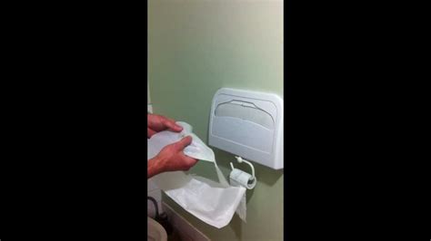 I use a piece of toilet paper to flush and to unlock the. How to use a Disposable Toilet Seat Cover - YouTube