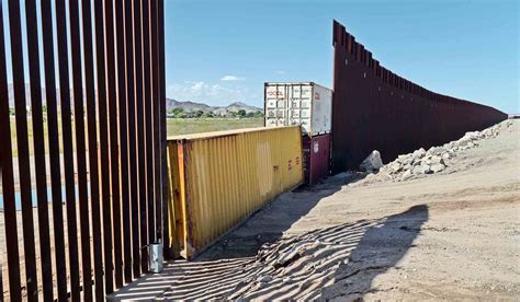 Justice Department Sues Arizona Over Governors Shipping Container