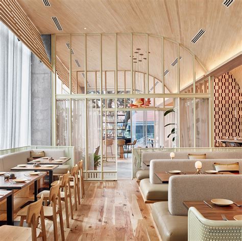 Michael Hsu Office Of Architecture Has Designed A Curved Wood Ceiling