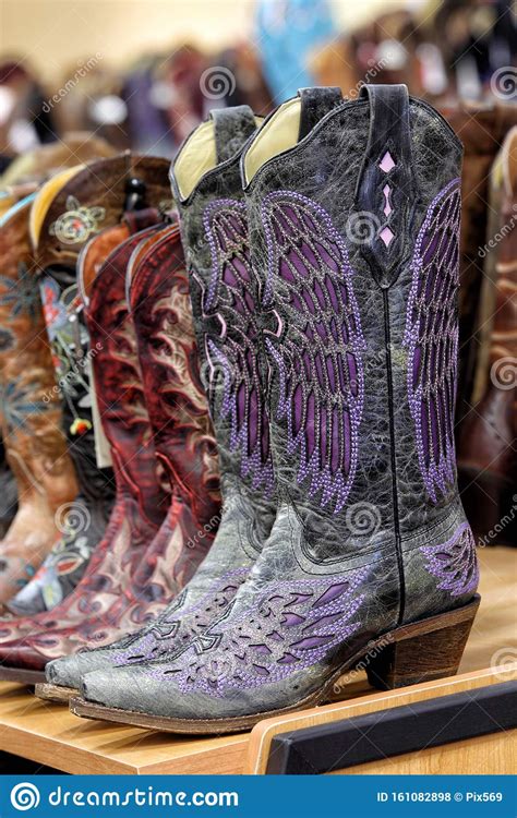 You can visit boot barn facebook, twitter and other social media for the latest boot barn in store coupons. Boots For Sale In A Boot Barn Retail Store. Stock Photo ...
