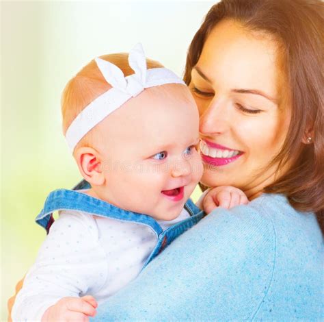 Mom And Baby Girl Kissing And Hugging At Home Stock Image Image Of Babe Baby