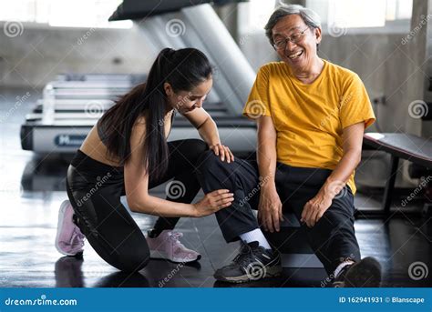 Old Man Massage Leg By Girl In Gym Stock Image Image Of Fitness Pain