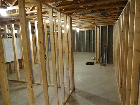 I'm thinking with a basement and the possibility of moisture i should just if water is a problem with your wood frame construction then you have much more serious problems as your walls will be rotting, mold growing, etc. How Do You Frame a Basement Wall?
