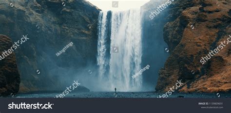 Woman Overlooking Waterfall Skogafoss Iceland Stock Photo 1139809691