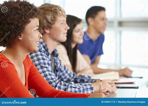 Multi Racial Teenage Pupils In Class Stock Photo Image Of Listening