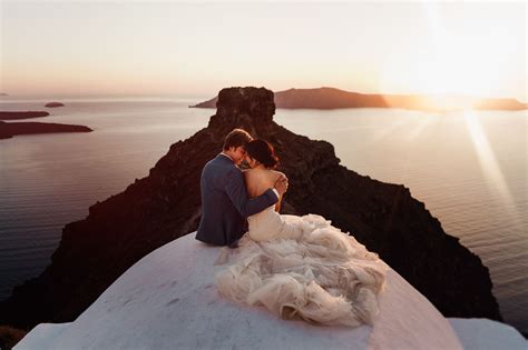 bride, groom, couple, love, romance, sunset, amazing view, Caldera, Santorini, The Diamond Rock ...