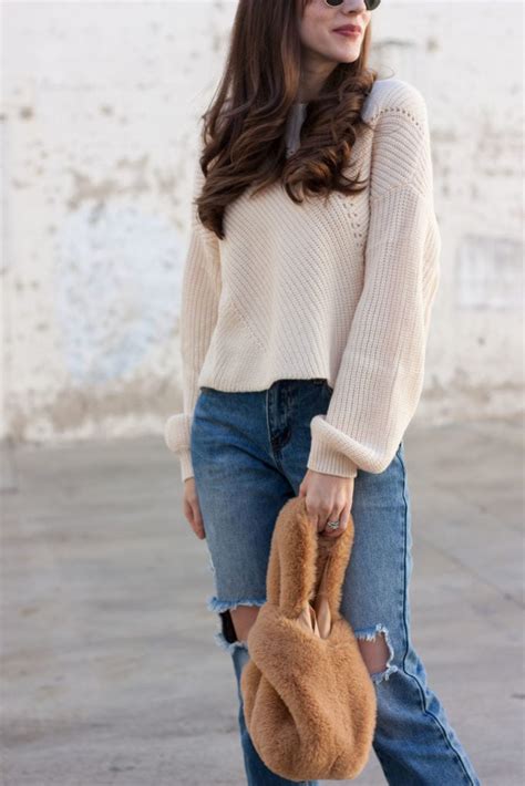 oversized sweaters and ripped jeans jeans and a teacup