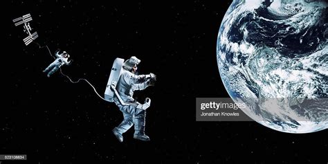 Astronaut Floating In Space High Res Stock Photo Getty Images