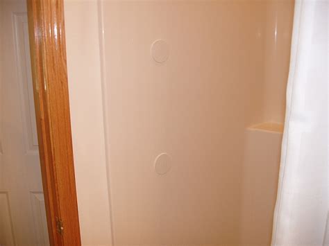 Staying At Home Installing Grab Bars In Fiberglass Showers