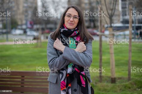 Young Beautiful Deaf Woman Is Gesturing In Sign Language Stock Photo