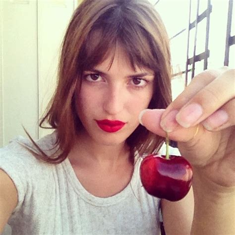 parisian jeanne damas s signature red lipstick on instagram vogue