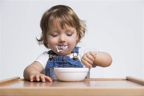 Content Boy Eating His Porridge Stock Photo Image Of Adorable Food