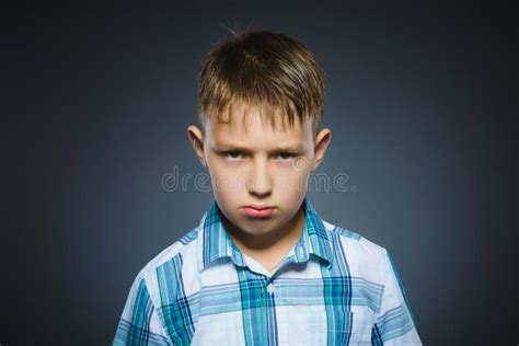 Portrait Angry Boy Isolated Gray Background Raised His Fist To Strike