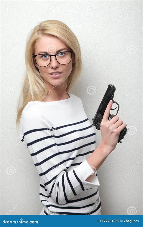 Girl Holding Gun Stock Photo Image Of Cosmetics Hairstyle 177234062