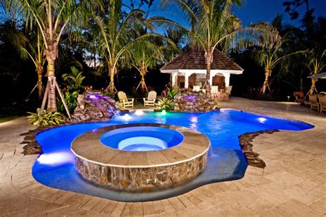 Lagoonfreeform Swimming Pool With Raised Spa And Led Lights In Coral