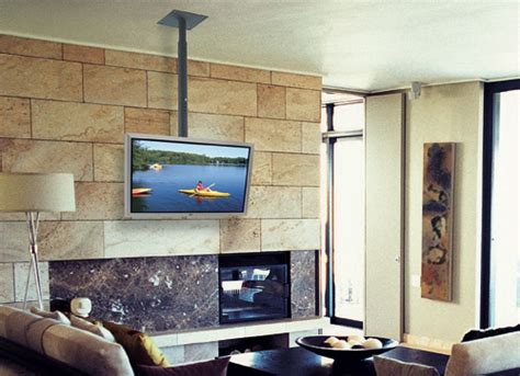 Tv wall mounts come in a wide range of prices and sizes, and it's important to make sure that the mount you choose is compatible with the tv you have. 9 Smarter Spots for the TV | Tv over fireplace, Tv hanging ...