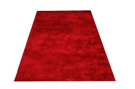 A Red Rug On A White Background With No One In The Room To See It