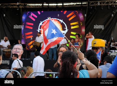 Puerto Ricans Waving Flags At The Fiesta Boricua Puerto Rican Festival
