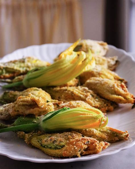 A single plant can produce up to 50 flowers per season. Baked stuffed zucchini blossoms and me in the paper ...