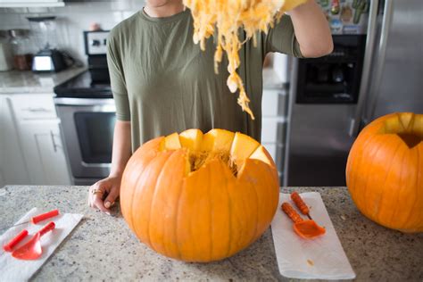 Couples Carving Pumpkins To Celebrate Halloween Together