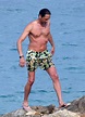Adrien Brody hilariously turns a blind eye to nude paddle-boarder in Ibiza