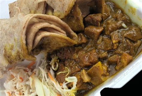The Sweet Life Ja — Curry Goat Served With Roti And Shredded Veg Curry Goat Jamaican