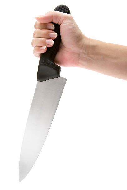 Woman Holding Knife Stock Photos Pictures And Royalty Free Images Istock