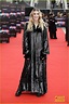 Honor Swinton Byrne Rocks A Shiny Trench Look For 'The Souvenir: Part ...