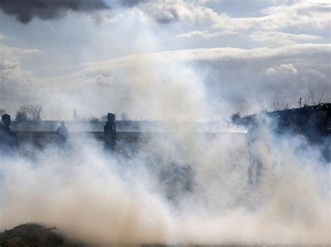 Tear Gas Fired From Both Sides As Migrants Bid To Cross Turkey Greece