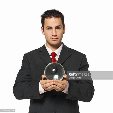 Man Holding Crystal Ball Photos And Premium High Res Pictures Getty