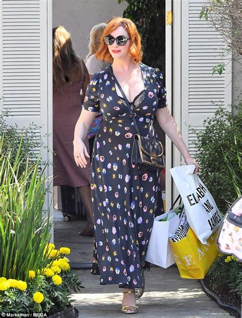 Christina Hendricks Flashes Her Bra In A Plunging Gown At Instyle Bash