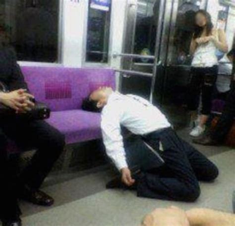 Photos Of Drunken Japanese Salarymen In Various Poses On The Train