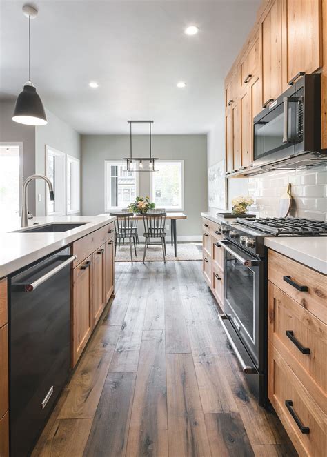 Pin By Kristin Whitaker On Th Ave Vinyl Flooring Kitchen Natural Wood Kitchen Cabinets