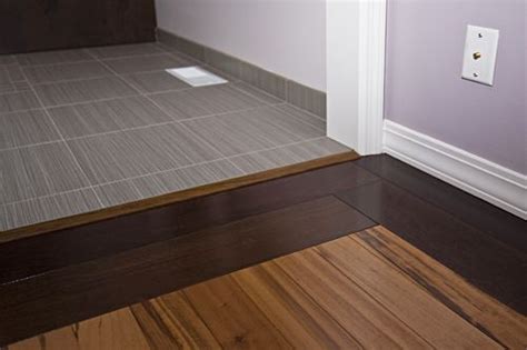 Tile Floors With A Wood Border Using Different Species Of Woods And