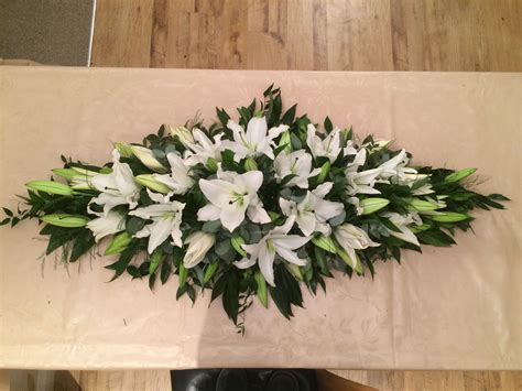 At 24hrscity florist, casket flowers are specially. White Lily 4' Funeral Coffin Spray - created by Willow ...