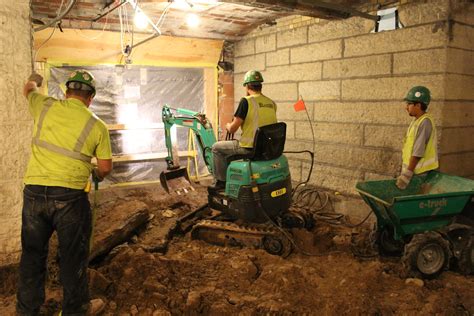 How much does it cost to turn an unfinished basement into a finished basement?, denver, 14 replies who do i hire to excavate my sewer line and for how much?, house, 12 replies is it possible to recover/excavate a swimming pool that has … how to excavate a basement. Workers excavate basement for new mechanical, electrical a ...
