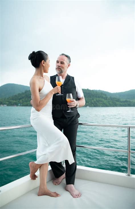 happy moments of interracial couples on a yacht the couple had their honeymoon at one of asia s