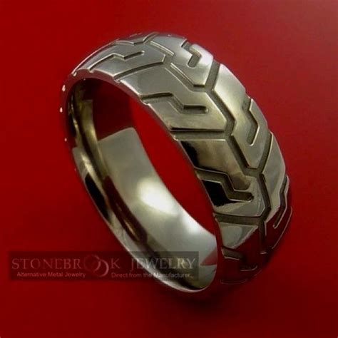 These strong but lightweight rings are a bold statement to the love of the great outdoors. Motorcycle Wedding Bands | Motorcycle Tire Tread ring ...